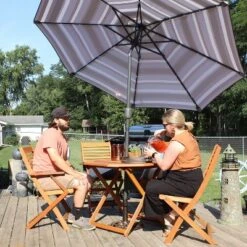 Sunnydaze Decor Sunnydaze Outdoor Meranti Wood With Teak Oil Finish Folding Patio Dining Table And Chairs - Brown - 5pc -Crosley shop GUEST 265be565 1c11 42c5 a038 49f1686bd25c