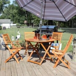 Sunnydaze Decor Sunnydaze Outdoor Meranti Wood With Teak Oil Finish Folding Patio Dining Table And Chairs - Brown - 5pc -Crosley shop GUEST bf6fb631 b81f 4441 a74f 0de6c368bc0a